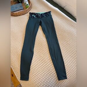 Lululemon Athletica Dark Green Leggings with Blue Pattern Waistband